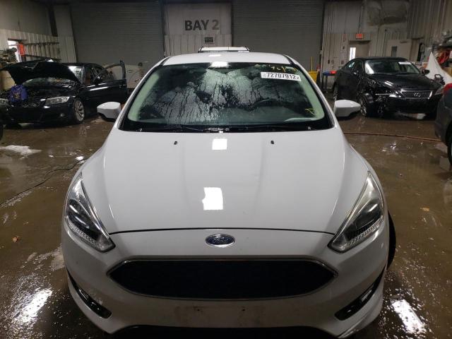 Photo 5 from auction – 2016 FORD FOCUS SE with VIN 1FADP3F21GL368449