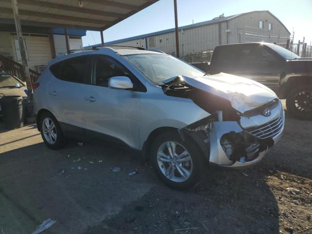 Photo 4 from auction – 2011 HYUNDAI TUCSON GLS with VIN KM8JUCAC8BU200411