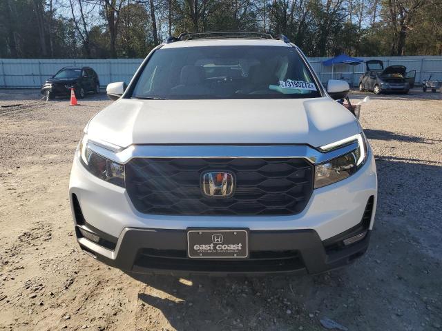 Photo 5 from auction – 2022 HONDA PASSPORT E with VIN 5FNYF7H52NB003050