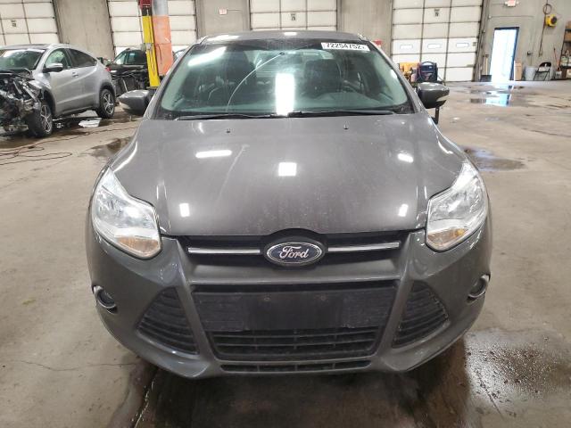 Foto 5 de la subasta – 2013 FORD FOCUS SE con VIN 1FADP3F21DL164083