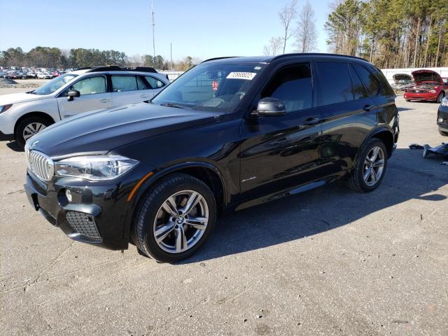 BMW X5 XDRIVE5 2014 with VIN 5UXKR6C58E0C03221 - Photo from auction