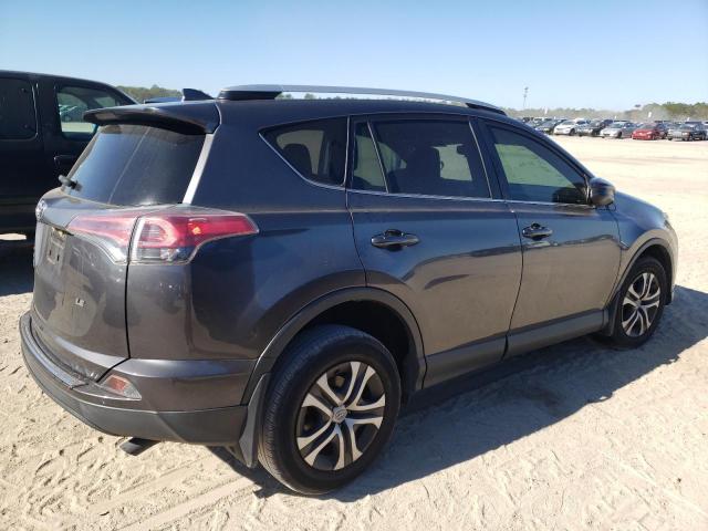 Photo 3 from auction – 2016 TOYOTA RAV4 LE with VIN JTMZFREV4GJ093690