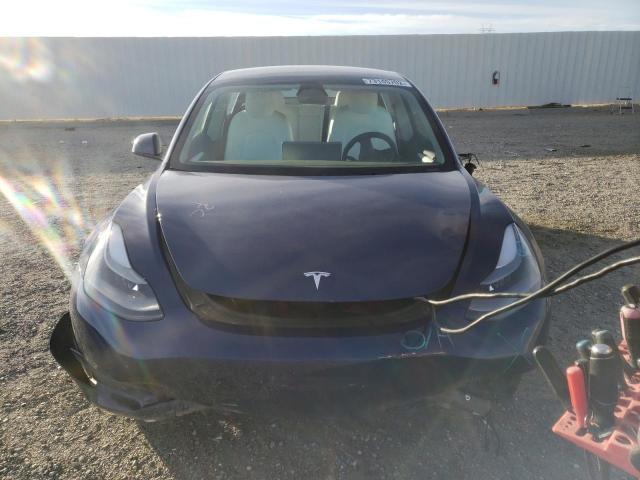 Photo 5 from auction – 2022 TESLA MODEL 3 with VIN 5YJ3E1EB1NF233523