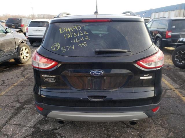 Photo 6 from auction – 2016 FORD ESCAPE SE with VIN 1FMCU0GX1GUB14642