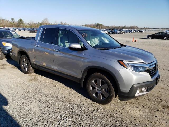 Photo 4 from auction – 2020 HONDA RIDGELINE with VIN 5FPYK3F70LB004551