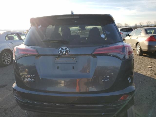 Photo 6 from auction – 2018 TOYOTA RAV4 LE with VIN JTMBFREV4JJ746575