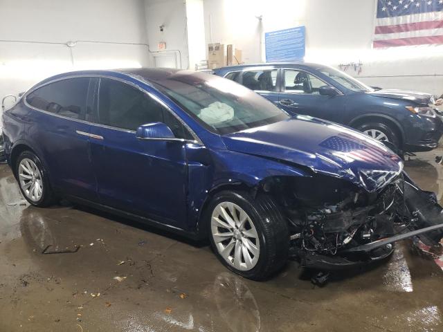 Photo 4 from auction – 2017 TESLA MODEL X with VIN 5YJXCAE27HF050431