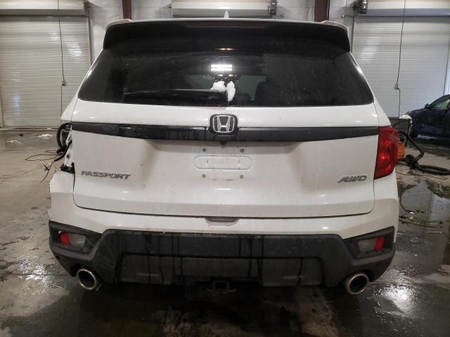 Photo 6 from auction – 2022 HONDA PASSPORT E with VIN 5FNYF8H52NB020596