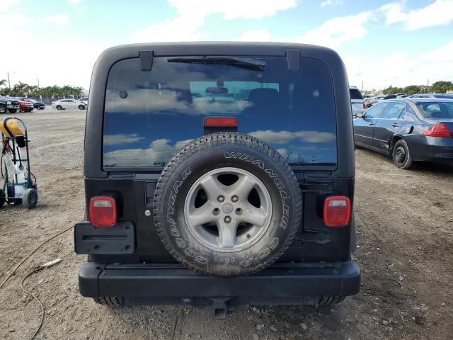 Photo 6 from auction – 2004 JEEP WRANGLER X with VIN 1J4FA39S24P744820