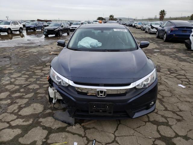 Photo 5 from auction – 2018 HONDA CIVIC EX with VIN JHMFC1F32JX040919