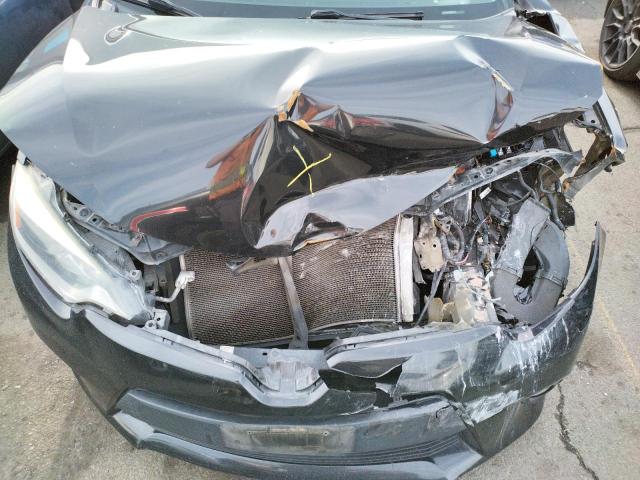 Photo 11 from auction – 2014 TOYOTA COROLLA L with VIN 5YFBURHE4EP044839