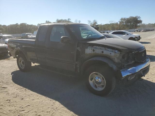 Photo 4 from auction – 2000 FORD F150 with VIN 1FTRX18W6YNB67379