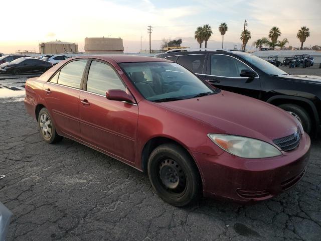 Photo 4 from auction – 2002 TOYOTA CAMRY LE with VIN JTDBE32K320032843
