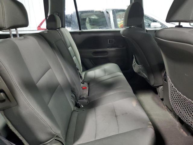 Photo 10 from auction – 2006 HONDA PILOT LX with VIN 5FNYF181X6B028676