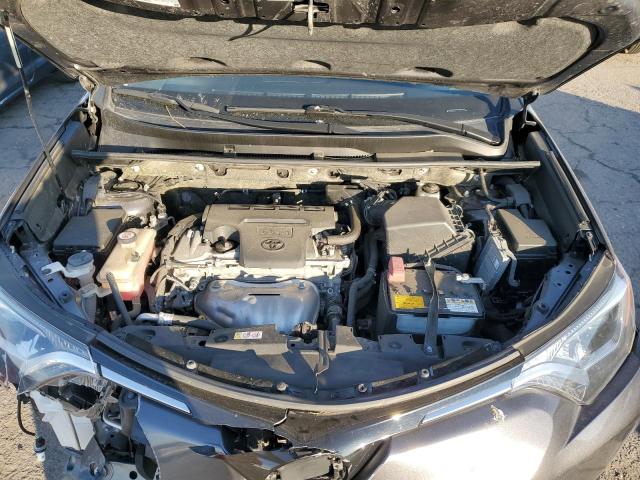 Photo 11 from auction – 2018 TOYOTA RAV4 LE with VIN JTMBFREV4JJ746575