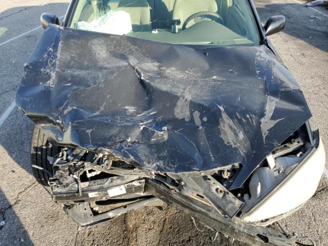Photo 11 from auction – 2002 TOYOTA CAMRY LE with VIN JTDBE32K620032707