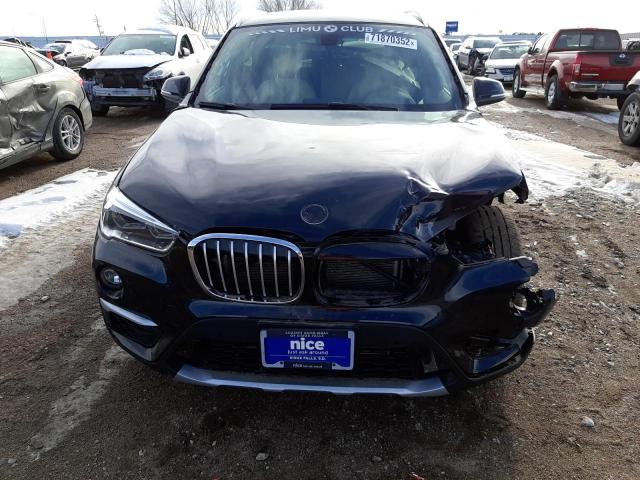 Photo 5 from auction – 2017 BMW X1 XDRIVE2 with VIN WBXHT3C38H5F86839