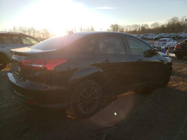 Photo 3 from auction – 2016 FORD FOCUS SE with VIN 1FADP3F23GL323965