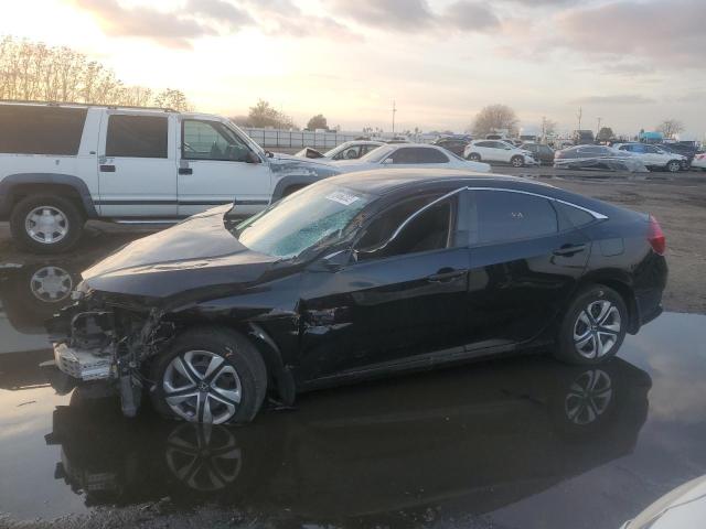 HONDA CIVIC LX 2016 with VIN 2HGFC2F54GH500198 - Photo from auction