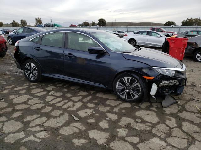 Photo 4 from auction – 2018 HONDA CIVIC EX with VIN JHMFC1F32JX040919