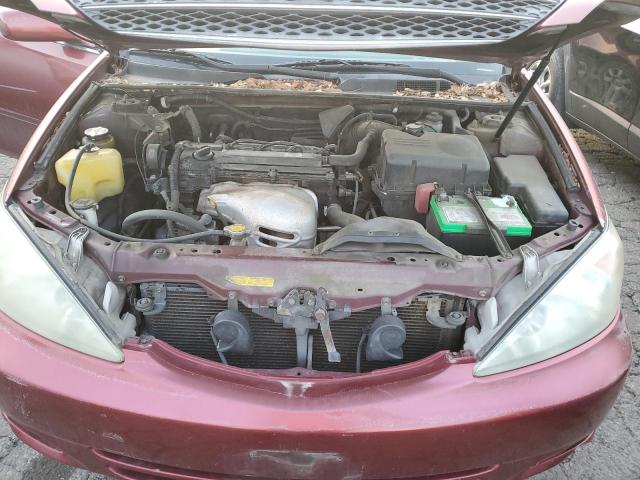 Photo 11 from auction – 2002 TOYOTA CAMRY LE with VIN JTDBE32K320032843