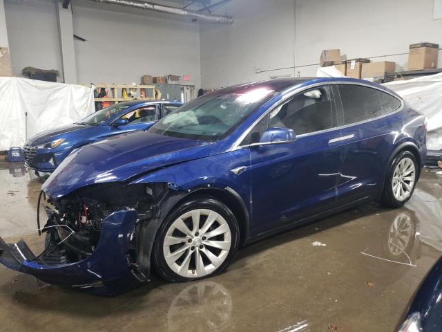 TESLA MODEL X 2017 with VIN 5YJXCAE27HF050431 - Photo from auction