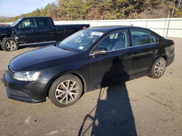 VOLKSWAGEN JETTA SE 2018 with VIN 3VWDB7AJ0JM217796 - Photo from auction