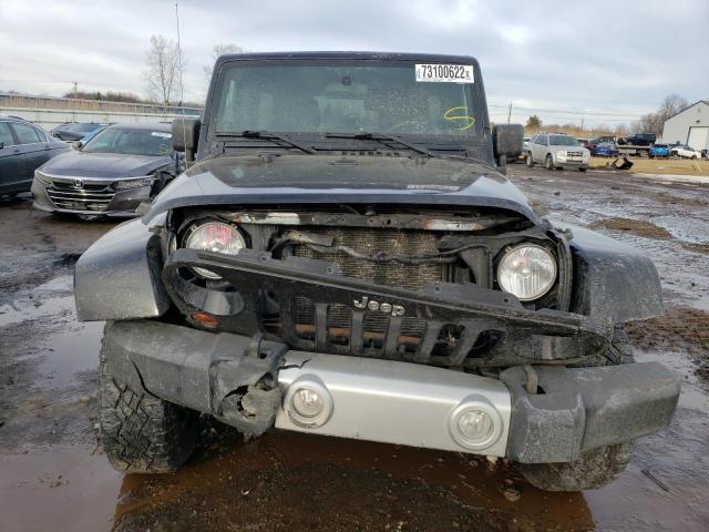 Photo 5 from auction – 2011 JEEP WRANGLER U with VIN 1J4BA5H16BL636322