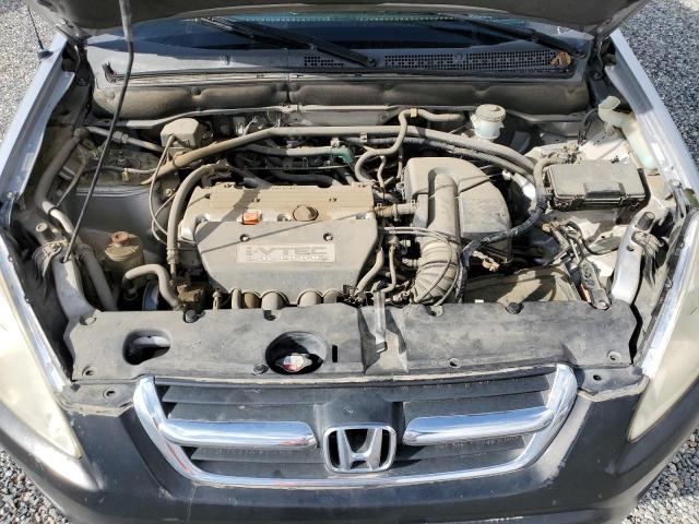 Photo 12 from auction – 2002 HONDA CR-V LX with VIN JHLRD68472C003570