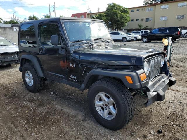 Photo 4 from auction – 2004 JEEP WRANGLER X with VIN 1J4FA39S24P744820