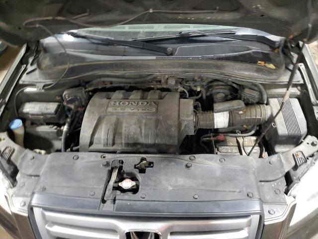 Photo 11 from auction – 2006 HONDA PILOT LX with VIN 5FNYF181X6B028676