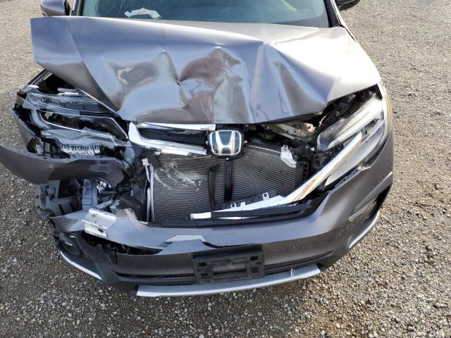 Photo 12 from auction – 2020 HONDA PILOT ELIT with VIN 5FNYF6H0XLB058227
