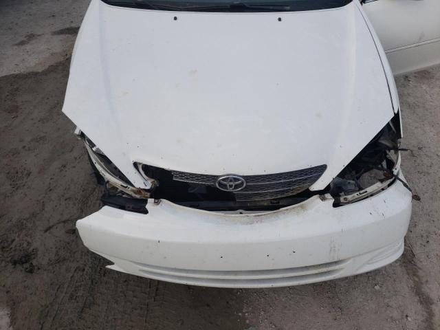 Photo 11 from auction – 2003 TOYOTA CAMRY LE with VIN 4T1BE32K03U205496