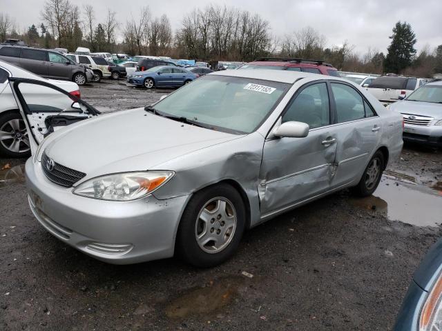 TOYOTA CAMRY LE 2002 with VIN 4T1BF32K92U017037 - Photo from auction
