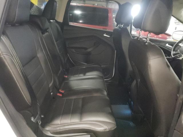 Photo 11 from auction – 2014 FORD ESCAPE TIT with VIN 1FMCU9J98EUB80987