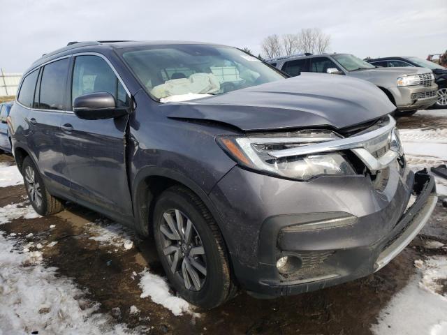 Photo 4 from auction – 2022 HONDA PILOT EXL with VIN 5FNYF6H53NB033622