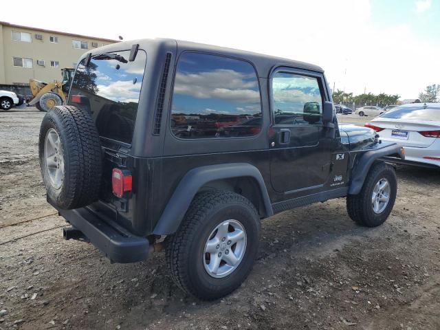 Photo 3 from auction – 2004 JEEP WRANGLER X with VIN 1J4FA39S24P744820