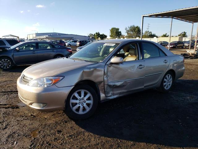 TOYOTA CAMRY LE 2003 with VIN 4T1BF30K73U558883 - Photo from auction