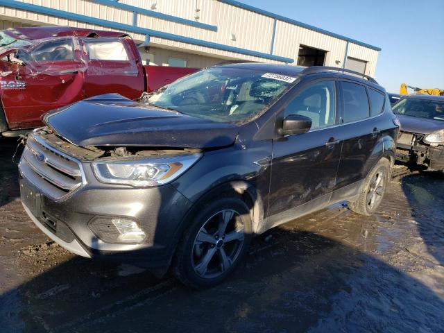 FORD ESCAPE SE 2017 with VIN 1FMCU0GD5HUD49004 - Photo from auction