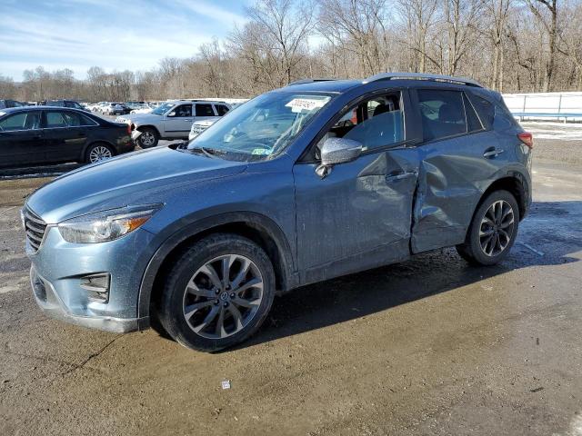 MAZDA CX-5 GT 2016 with VIN JM3KE4DY4G0606968 - Photo from auction