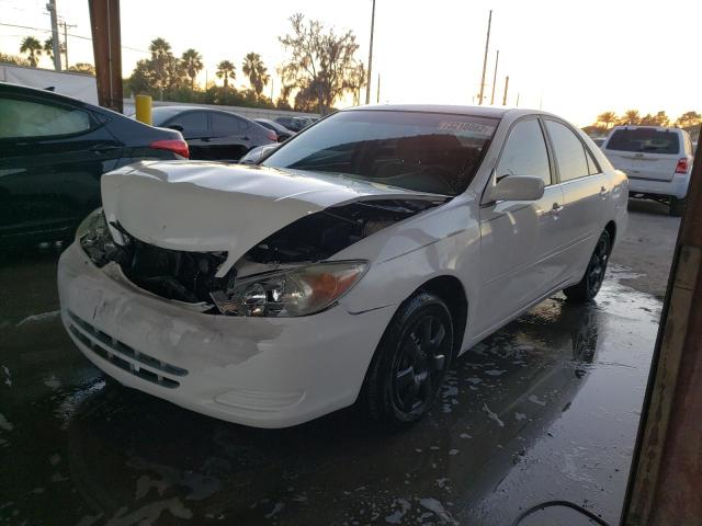 TOYOTA CAMRY LE 2002 with VIN 4T1BE32K72U014320 - Photo from auction