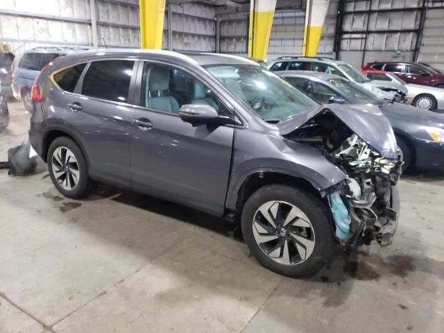 Photo 4 from auction – 2016 HONDA CR-V TOURI with VIN 5J6RM4H99GL020532