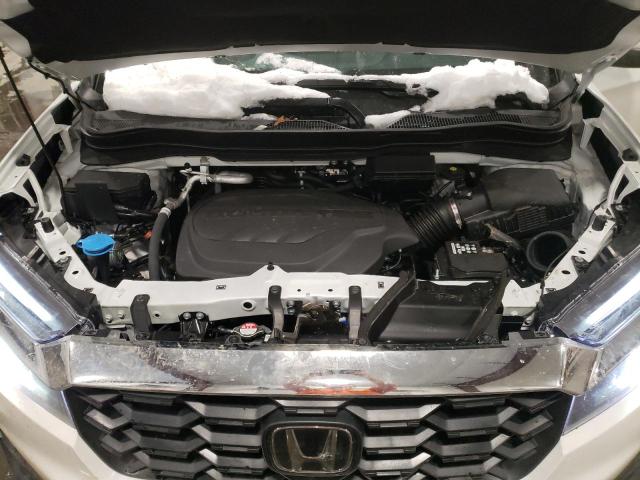 Photo 12 from auction – 2022 HONDA PASSPORT E with VIN 5FNYF8H52NB020596