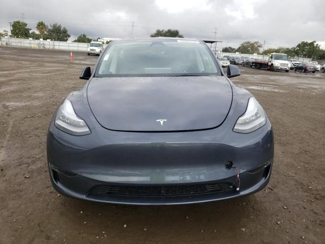 Photo 5 from auction – 2023 TESLA MODEL Y with VIN 7SAYGDEE0PA030279