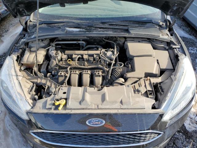 Photo 11 from auction – 2016 FORD FOCUS SE with VIN 1FADP3K22GL364741