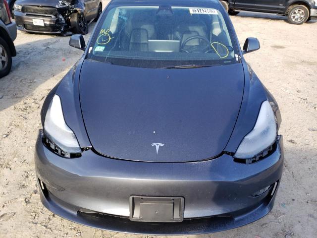Photo 11 from auction – 2022 TESLA MODEL 3 with VIN 5YJ3E1EA7NF192077