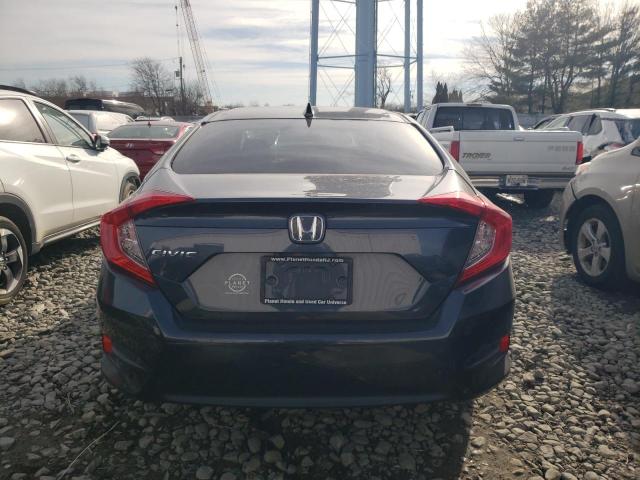 Photo 6 from auction – 2018 HONDA CIVIC EX with VIN 2HGFC2F74JH524235
