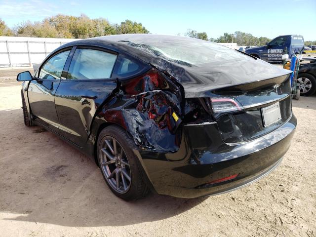 Photo 2 from auction – 2021 TESLA MODEL 3 with VIN 5YJ3E1EA8MF087661