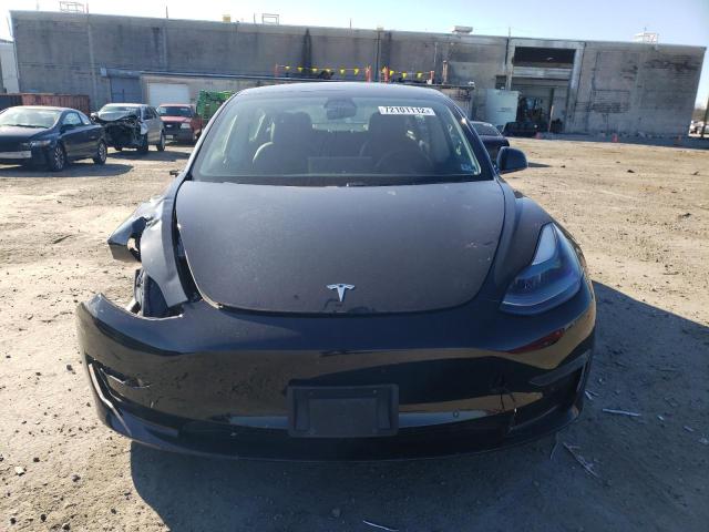 Photo 5 from auction – 2021 TESLA MODEL 3 with VIN 5YJ3E1EA2MF977024