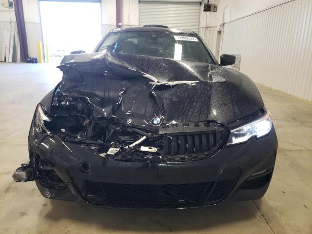 Photo 5 from auction – 2021 BMW 330I with VIN 3MW5R1J02M8C13444